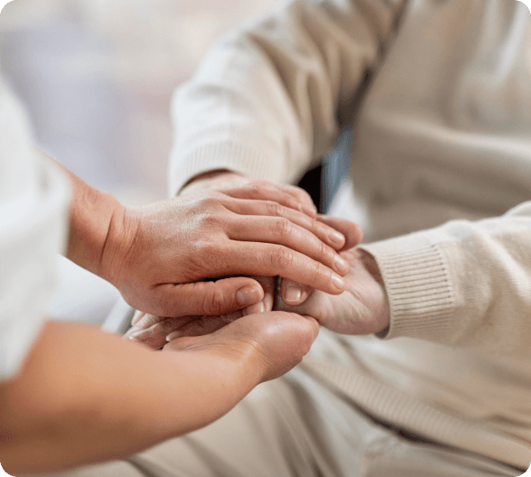 Cardioprev: Quem somos - um close de mãos segurando a mão de uma pessoa